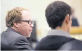  ?? ADOLPHE PIERRE-LOUIS/JOURNAL ?? Attorney Stephen Taylor, left, and his client Nehemiah Griego appear in a Children’s Court hearing on Monday.