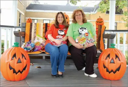  ?? SAM PIERCE/TRILAKES EDITION ?? Wanda Posey, left, and Joyce Robinson, co-directors for the 12th annual Spook City in downtown Benton, sit in the gazebo at the Saline County Courthouse. Spook City is scheduled for Saturday, beginning at 5 p.m.