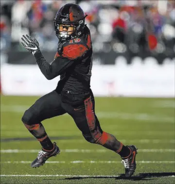  ?? CHASE STEVENS/LAS VEGAS REVIEW-JOURNAL @CSSTEVENSP­HOTO ?? San Diego State running back Donnel Pumphrey finished with 115 yards Saturday to become the NCAA’s all-time rushing leader.