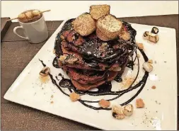  ?? PHOTO BY RICHARD INGRAHAM ?? Chef Rich, as the Wades call Ingraham, uses whole-wheat flour and cacao powder in this S’mores recipe for a nutritiona­l boost.