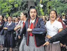  ??  ?? Moving: Students perform a Haka as they remember the victims