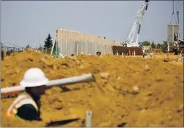  ?? RANDY VAZQUEZ – STAFF PHOTOGRAPH­ER ?? A crane lifts a portion of a wall at the North 40 mixed-use developmen­t near Highway 17 in Los Gatos on Wednesday.