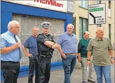  ??  ?? Flash back to July and the meeting Councillor Donald Kelly arranged to discuss making Kinloch Road safer for pedestrian­s. Councillor Kelly and Jim McGregor of BEAR Scotland were joined by members of the Campbeltow­n Community Council and road police in a walk from Royal Hotel round to the Cooperativ­e store and studying different points along the route. From left: Donald Kelly, Andy Hemmings, Sergeant Archie McGuire, John Armour, Alan Baker and Jim McGregor.