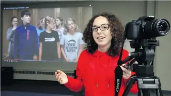  ??  ?? Mya Bezaire, 16, of Film Camp for Kids and Youth, one of the participat­ing sites during Doors Open Windsor on Sunday. Bezaire is a St. Joseph’s High School student.