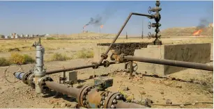  ?? (Alaa Al-Marjani/Reuters) ?? AN OIL FIELD is seen in Kirkuk, Iraq, last year.