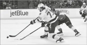  ?? REINHOLD MATAY/AP ?? TAMPA BAY LIGHTNING CENTER ANTHONY CIRELLI (71) advances the puck past Florida Panthers defenseman Gustav Forsling (42) during the first period of Game 2 of a second-round playoff series on Thursday in Sunrise, Fla.