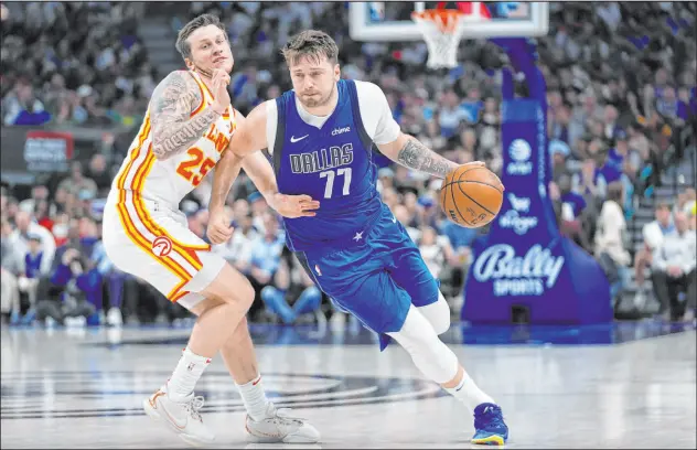  ?? LM Otero
The Associated Press ?? Dallas Mavericks guard Luka Doncic is averaging 33.9 points per game this season, which is tops in the NBA by a wide margin.