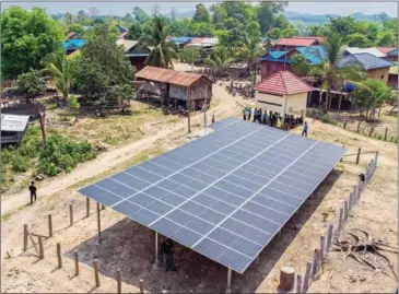  ?? UNDP CAMBODIA ?? A solar mini-grid in in Phi village, home to members of the Jarai indigenous community, along the Sesan River in Ratanakiri province on December 2023.