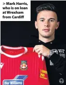  ??  ?? > Mark Harris, who is on loan at Wrexham from Cardiff