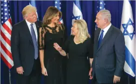  ?? (Marc Israel Sellem/The Jerusalem Post) ?? US PRESIDENT DONALD Trump and his wife, Melania, pose with Prime Minister Benjamin Netanyahu and his wife, Sara, at the Prime Minister’s Residence yesterday.