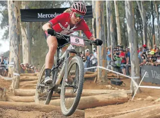  ?? /Shaun Roy/Gallo Images ?? Sure bet: Annika Langvad from Denmark on her way to victory at Sunday’s MTN World Cup in Stellenbos­ch. From Sunday the Dane will be gunning for her third Cape Epic title.