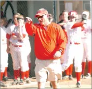  ?? MIKE CAPSHAW ENTERPRISE-LEADER ?? Coach Randy Osnes has built Farmington into one of the top softball programs in the state. The Lady Cardinals should be strong again next season with many key players returning.
