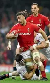  ?? GETTY IMAGES ?? Josh Navidi with ball in hand makes a run for Wales against England in a Six Nations match earlier this year.