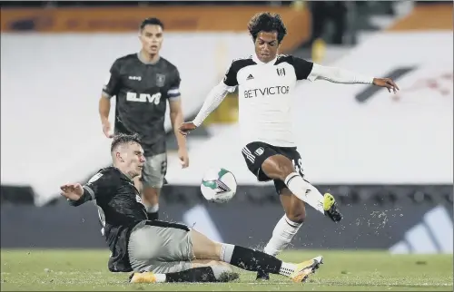  ?? PICTURE: PA ?? CUP CLASH: Sheffield Wednesday youngster Liam Shaw and Fulham’s Fabio Carvalho battle for the ball during their Carabao Cup third round match at Craven Cottage.