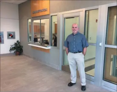  ?? EVAN BRANDT — DIGITAL FIRST MEDIA ?? Limerick Township Manager Dan Kerr outside the administra­tion wing of the new township building that opened in August.