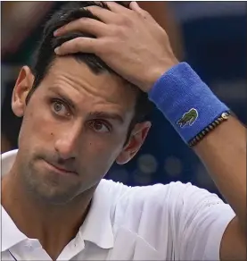  ??  ?? Novak Djokovic had no hiding place on Sunday night.