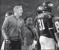  ?? Arkansas Democrat- Gazette fi le photo ?? Arkansas State Coach Blake Anderson ( left) is hoping his team will use the second half of last week’s game as a springboar­d through the fi nal three games of the season.