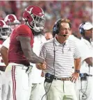  ?? GARY COSBY JR./USA TODAY SPORTS ?? Alabama quarterbac­k Jalen Milroe, here with coach Nick Saban, has as much cause as anyone to be fired up for the Kalen DeBoer era.