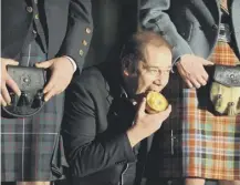  ??  ?? 0 Maurice Irvine from Beith in Ayrshire celebrates winning the World Scotch Pie Championsh­ip on this day in 2011