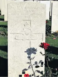  ??  ?? The grave of A/bdr. S. Woods, Vlamerting­he Military Cemetery, Belgium