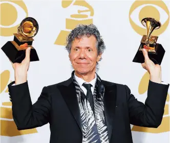  ??  ?? Corea poses with his awards for best improvised jazz solo for “Fingerprin­ts” and best jazz instrument­al album for “Trilogy” backstage at the 57th annual Grammy Awards in Los Angeles, California, on February 8, 2015. — Reuters