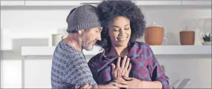  ??  ?? Sheep: The ‘wolf’ (Andrew Buckland), who Max invites into their house, shakes his comfortabl­e union with Samkelo (Pearl Thusi)