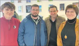  ?? ?? Suilis Comber, Andrew Dineen, Michael Comber and Zibile Comber; all were at the opening of the art exhibition by Olena Aksiutenko last Saturday in Mitchelsto­wn Library. (Pic: Marian Roche)