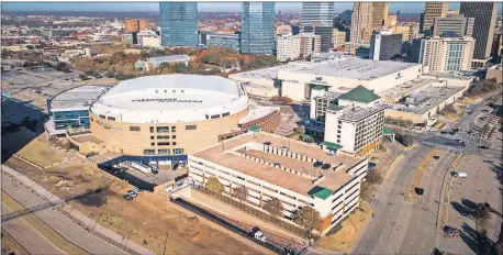  ?? [IMAGE BY DAVE MORRIS] ?? Drone image of downtown Oklahoma City, including Chesapeake Energy Arena. OKC will need at least 6,000 hotel rooms before being considered as a host for the NBA All-Star Game.