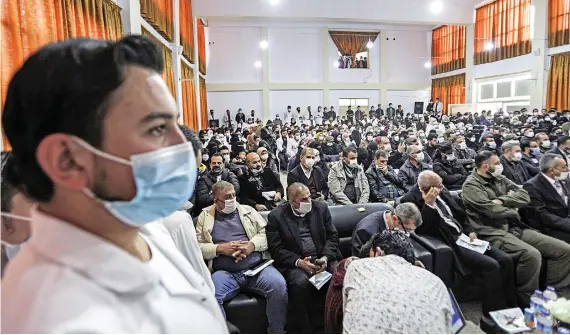  ?? AFP ?? Syrian students from Aleppo University in Liberated Areas are seen at their graduation ceremony on the campus in Azaz in the northern countrysid­e of Syria’s Aleppo province.