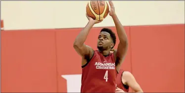  ?? NWA Democrat-Gazette/J.T. WAMPLER ?? Junior college transfer Daryl Macon, a Little Rock native who earned third-team juco All-American honors last season at Holmes (Miss.) Community College, is expected to bolster an Arkansas backcourt that returns three guards from last year’s team.