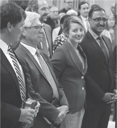  ?? PATRICK DOYLE/THE CANADIAN PRESS ?? Dominic Leblanc, from left, Jim Carr, Mélanie Joly, and Amarjeet Sohi attend a swearing-in ceremony Wednesday.