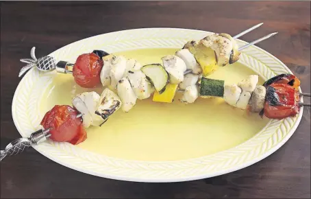  ?? [ERIC ALBRECHT/DISPATCH] ?? Chicken kebabs