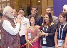  ??  ?? Modi being welcomed by the Indian community, on his arrival, to attend the 9th BRICS 2017, in Xiamen, China.