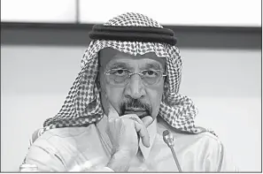  ?? AP/RONALD ZAK ?? “It’s been a great day,” Saudi Arabian oil minister Khalid Al-Falih said Thursday in Vienna after OPEC and allied oil-producing countries agreed to extend cuts in production through 2018.