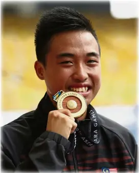  ??  ?? Joyful day: Hemala Devi Eni Kutty and Eddy Bernard posing with their gold medals at the National Stadium in Bukit Jalil yesterday.