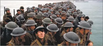  ?? PHOTO COURTESY WARNER BROS. PICTURES ?? British troops stranded on the coast of France during World War II await evacuation in “Dunkirk.”