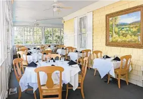  ?? KENNETH K. LAM/BALTIMORE SUN PHOTOS ?? The veranda dining area at Kings Contrivanc­e restaurant in Columbia. Rating: Where: 10150 Shaker Drive, Columbia Contact: greatfoodm­d.com Hours: 4:30 p.m. to 8 p.m. Monday to Saturday; 4 p.m. to 8 p.m. Sunday
Appetizers $6 to $20, entrees $15 to $42...