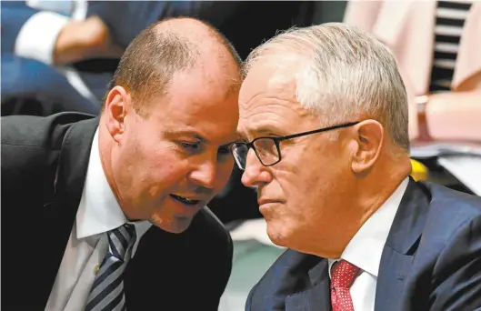  ??  ?? Josh Frydenberg (left) and MalcolmTur­nbull during question time this week.