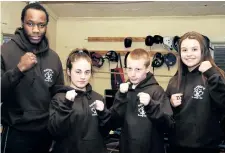  ?? JOE CSEH/SPECIAL TO POSTMEDIA NETWORK ?? Nappers Boxing Club fighters Dhumisani Masanzu, from left, Victoria Pagendam, Derek Cook and Samantha Pinckney won gold medals at the Brampton Cup tournament. Absent from photo is Christian Zelenco.