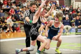  ?? NATE HECKENBERG­ER — FOR DIGITAL FIRST MEDIA ?? West Chester Henderson’s Sammy McMonagle celebrates after defeating Spring-Ford’s Shane Reynolds to clinch a trip to states.