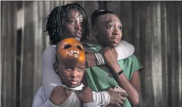  ?? Claudette Barius Universal Pictures ?? JORDAN PEELE’S “Us” with Lupita Nyong’o, clockwise from top left, Shahadi Wright Joseph, Evan Alex.