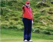  ?? BRIAN LAWLESS / PA VIA AP ?? Donald Trump gestures as he plays golf at Trump Internatio­nal Golf Links & Hotel in Doonbeg, Ireland, on Thursday.