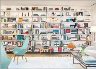  ?? Peter Vitale ?? THE BOOKSHELVE­S in Kerry Joyce’s Silver Lake office feature artful arrangemen­ts.