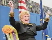  ?? Tyler Sizemore/Hearst Connecticu­t Media ?? Carolyn Lowe, 93, cheers during a surprise assembly in celebratio­n of her retirement at Hart Magnet Elementary School in Stamford in March 1.