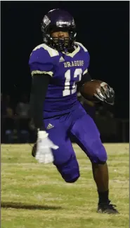  ?? Siandhara Bonnet/News-Times ?? Room to run: Junction City running back Jamal Johnson gets ready to turn upfield during the Dragons’ clash against Gurdon during the 2019 2A state semifinals. The Dragons focused on offense in their Monday practice.