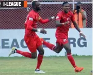  ??  ?? Churchill Brothers’ Mechac Koffi ( right) celebrates after scoring in their I- League match against Aizawl FC in Margao on Tuesday. Churchill won 1- 0.