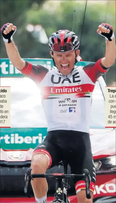  ??  ?? El polaco Rafal Majka celebra su heroica victoria en El Barraco, meta de la 15ª etapa de La Vuelta.