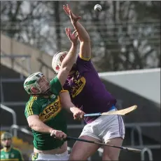  ??  ?? Liam Ryan of Wexford battles for the ball in the air with Kerry’s Pádraig Boyle.