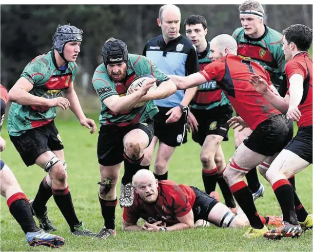  ?? Photograph: Kevin Emslie ?? ON THE MOVE: Highland’s Nathan McLaughlan bursts through the Mackie defence at Stonehaven.