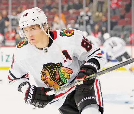  ?? Noah K. Murray/Associated Press ?? Chicago Blackhawks right wing Patrick Kane skates before a game against the New Jersey Devils on Dec. 6 in Newark, N.J.